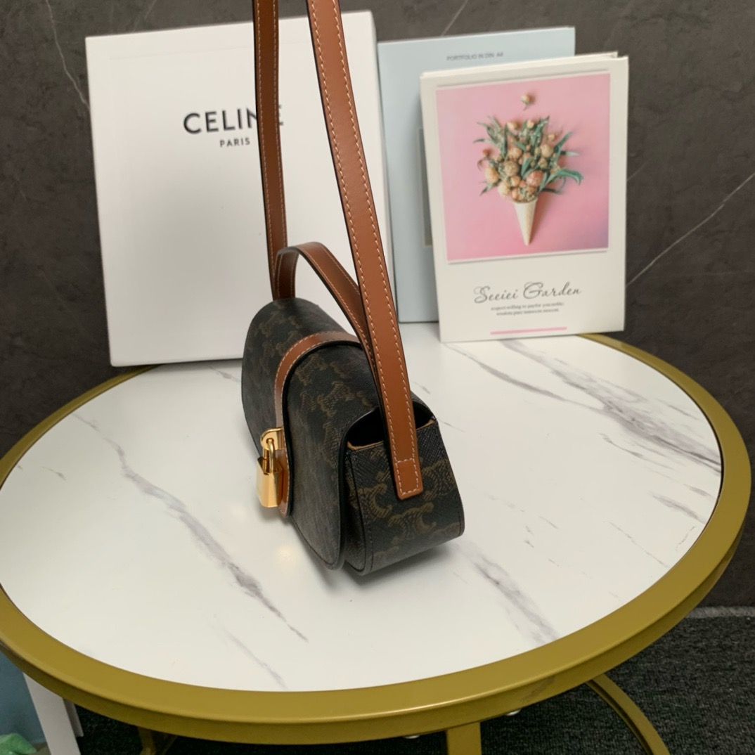 CELINE CLUTCH ON STRAP TABOU IN TRIOMPHE CANVAS AND CALFSKIN 101592 TAN