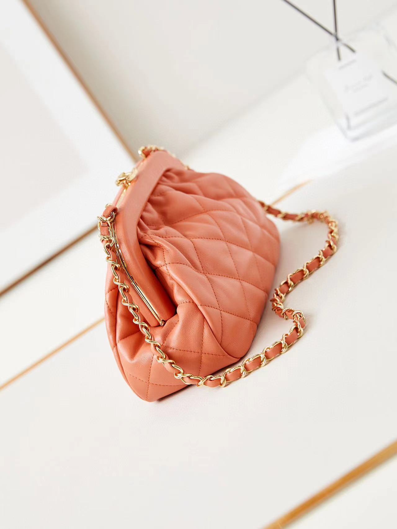 Chanel 24A CLUTCH WITH CHAIN AP1940 orange